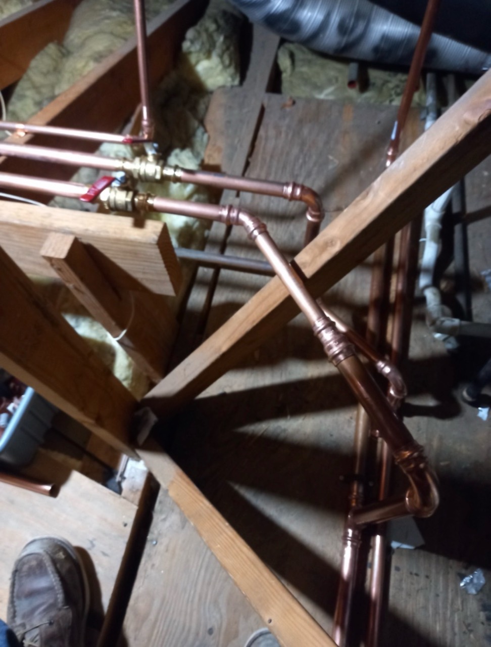 Copper repipe branch lines routed through existing attic framing